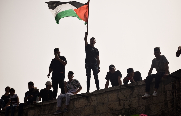 S'il n'y a rien d'illégal à brandir un drapeau palestinien en Israël, la pratique est souvent durement réprimée par la police, la rendant quasi impossible. ©Cécile Lemoine/TSM